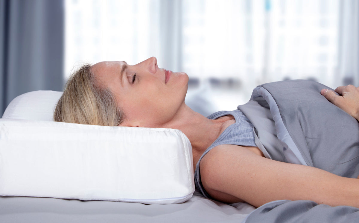 enVy pillow supporting the natural curve of the neck during back sleeping without pushing the head forward