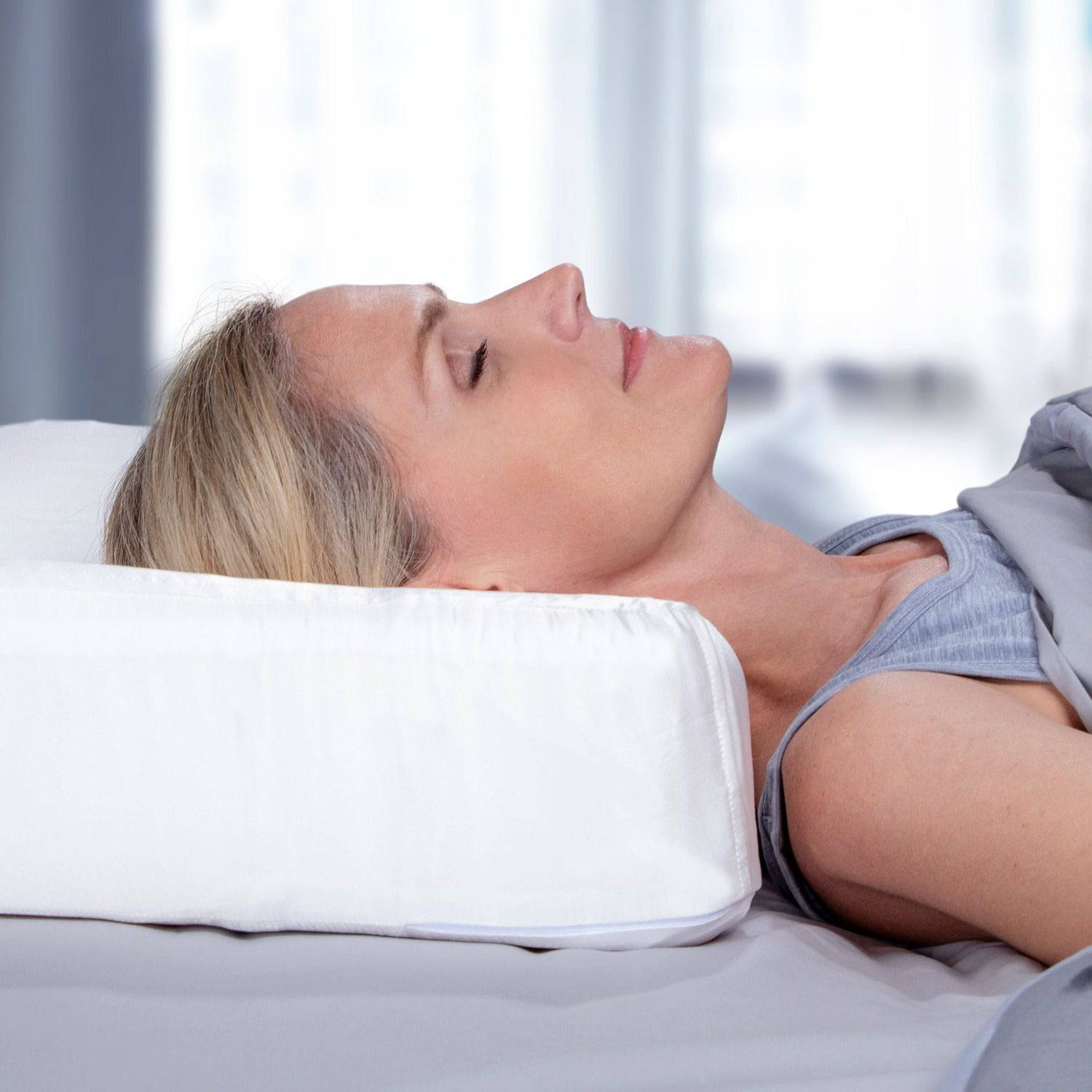 Back sleeping with Natural Latex Pillow with COPPER infused SILK pillowcase by enVy Pillow